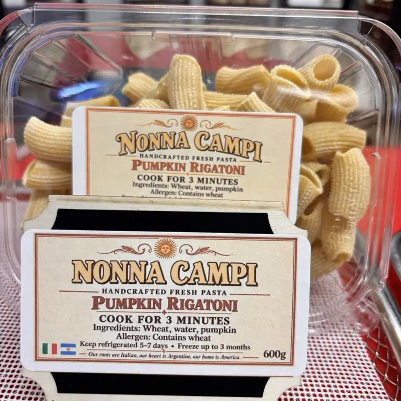 Pumpkin rigatoni tubs stacked on the counter