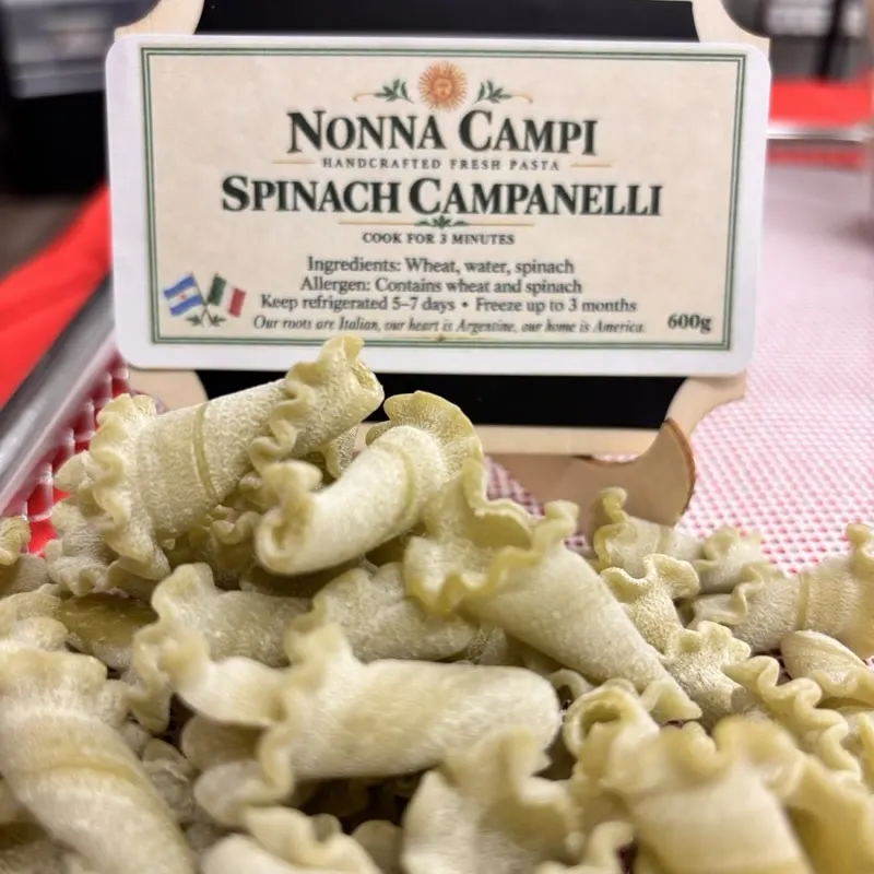 Spinach campanelle on the display counter