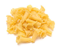 Pile of fresh campanelle pasta, little ruffled bell shapes.
